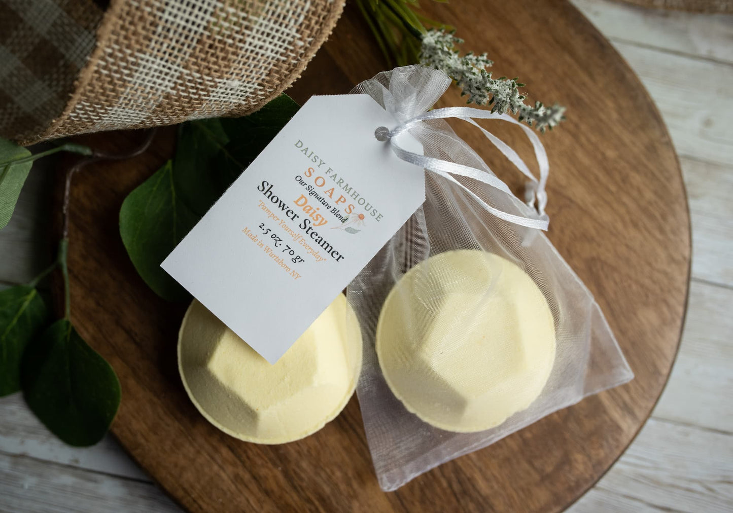 Lemongrass & Menthol Essential Oil blend shower steamers in our signature scent called the Daisy. 