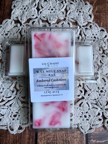 The Lil Daisy Soaps Ambered Cashmere Wax Melt-Long Lasting Snap Bar features a marbled design on lace.