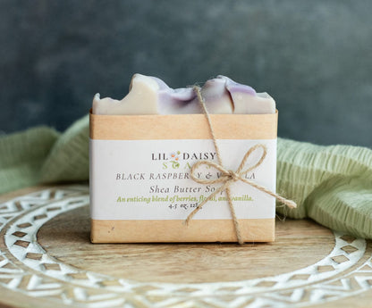 Lil Daisy Soaps Berries & Cream Goat Milk Soap Bar—gentle, natural skin care wrapped with paper and twine.