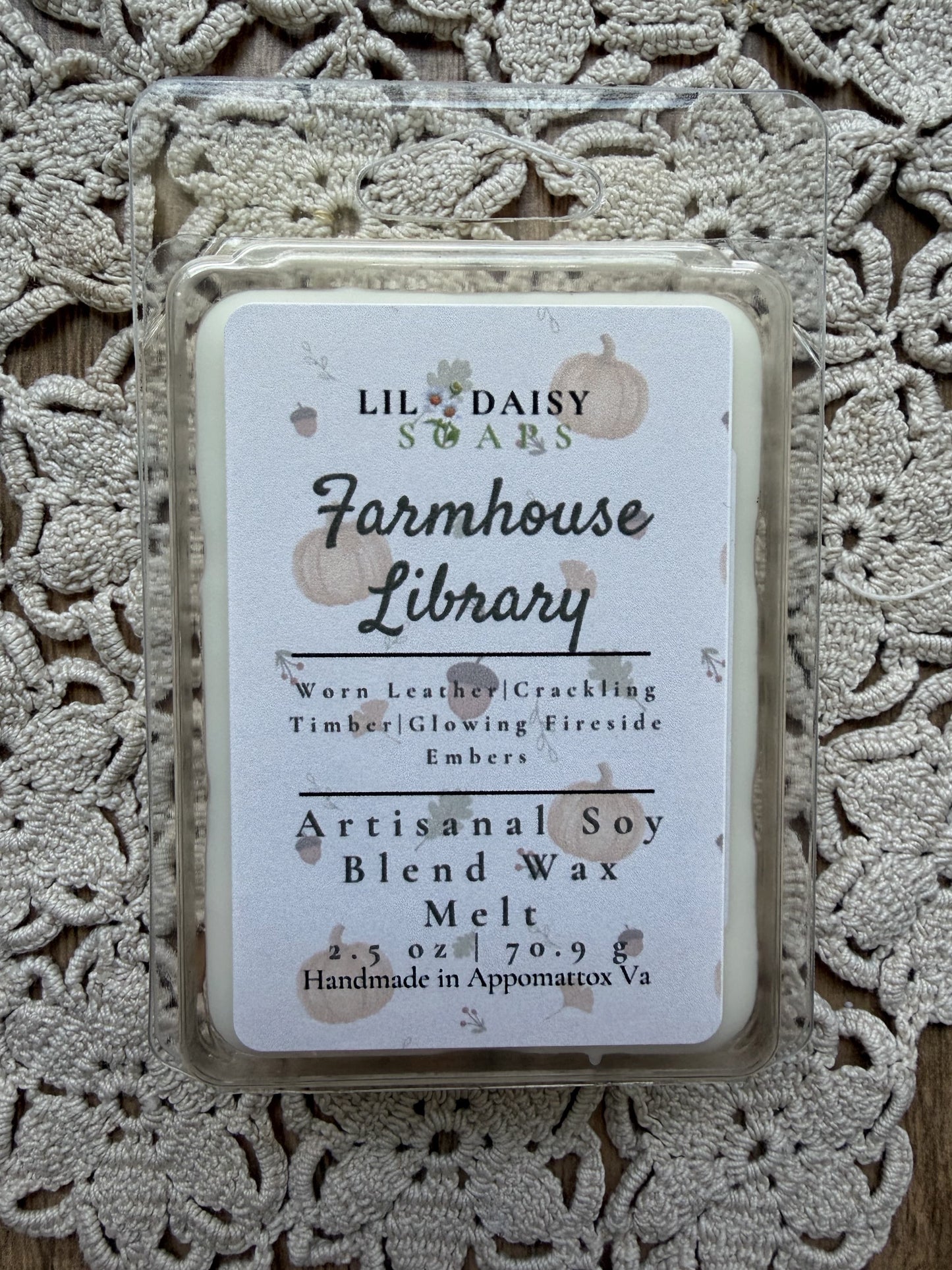 Farmhouse Library soy wax melts by Lil Daisy Soaps sit on a crochet doily. Handmade in Virginia.