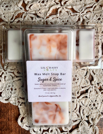 The Sugar & Spice Snap Bar Wax Melt by Lil Daisy Soaps fills your space with a bakery-inspired aroma.
