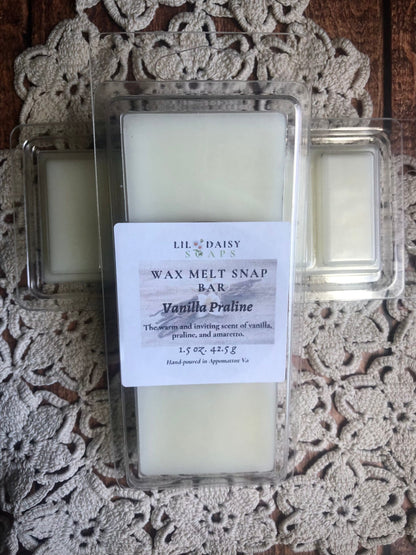 Lil Daisy Soaps Vanilla Praline Wax Melt-Long Lasting Snap Bar on a lace doily background.