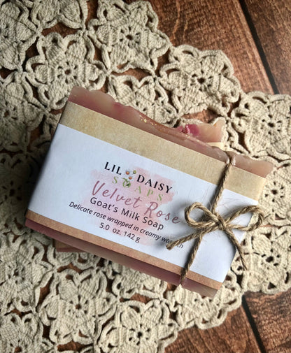 Lil Daisy Soaps Velvet Rose Goat Milk Soap—luxurious, handcrafted and tied with twine on a lace doily.