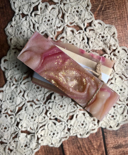 Velvet Rose Goat Milk Soap by Lil Daisy Soaps: handcrafted marbled swirls in pink, gold, and cream.
