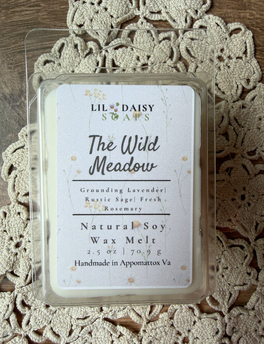 Wild Meadow Soy Wax Melts by Lil Daisy Soaps sit atop a crocheted doily, handmade in Virginia.